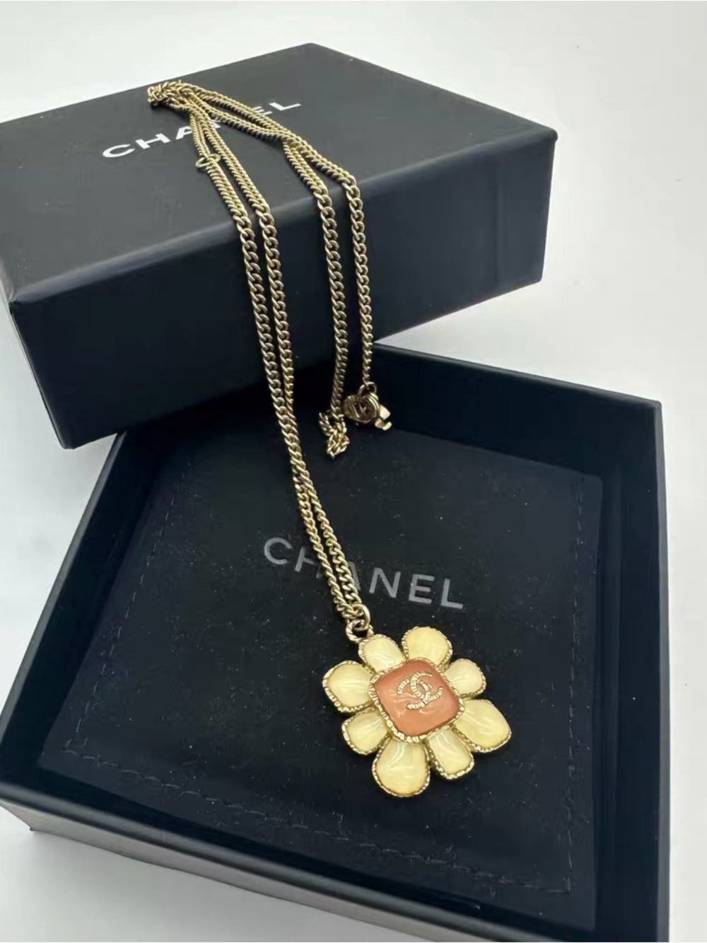 CHANEL Gold-Tone Flower Pendant Necklace with Peach Center